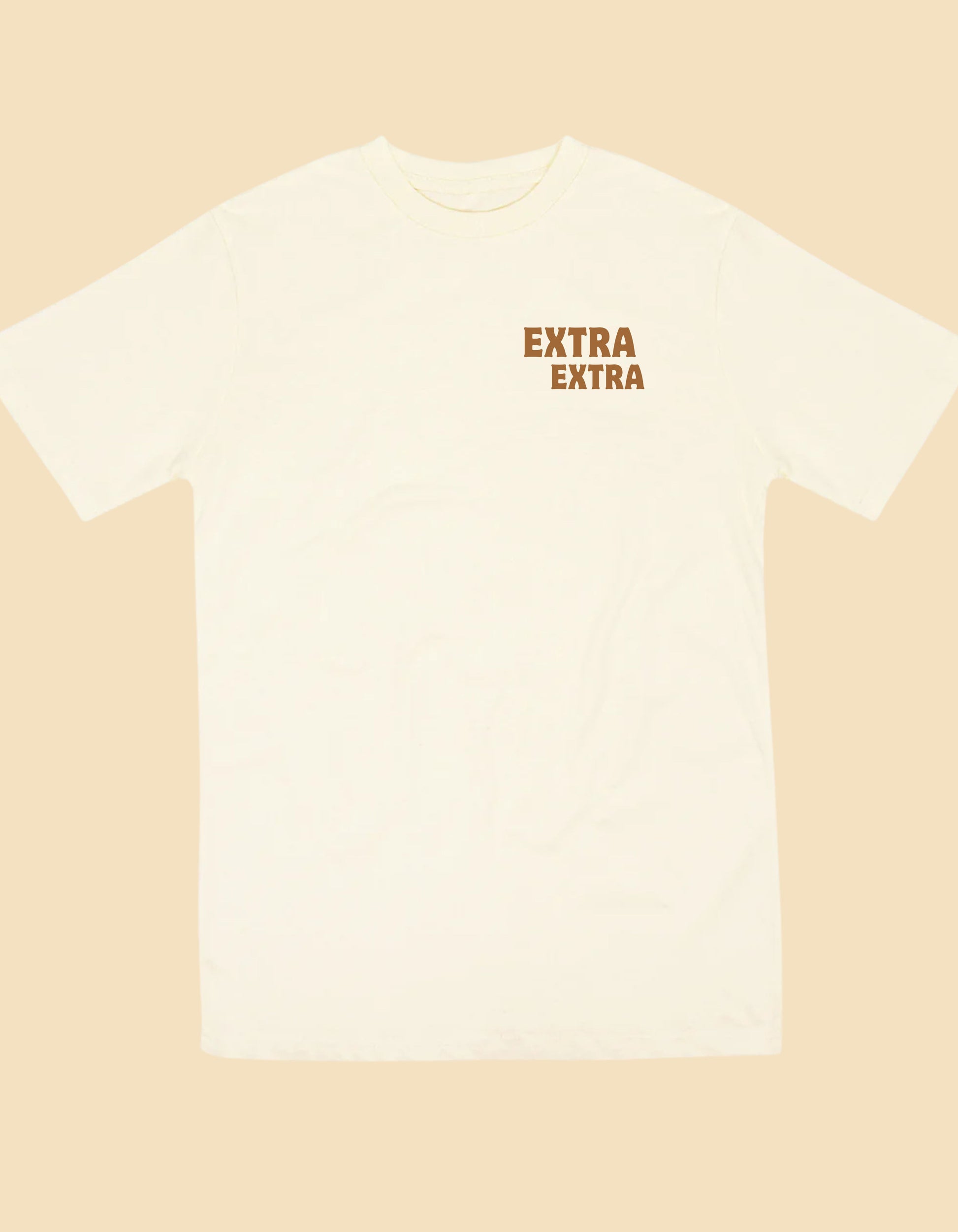 Cream t-shirt with 'Extra Extra' text on a beige background