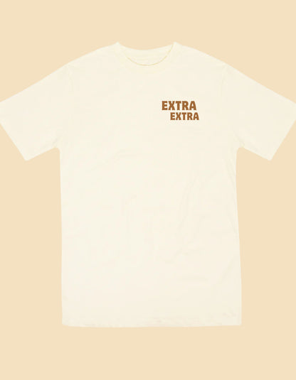 Cream t-shirt with 'Extra Extra' text on a beige background